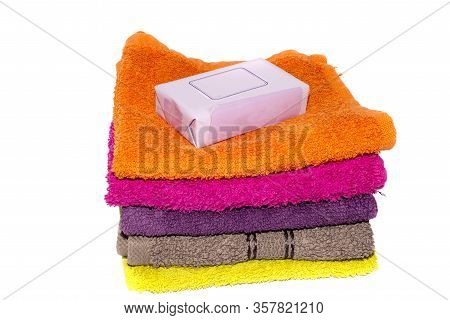 Soap On Top Of Facecloths Of Various Shades