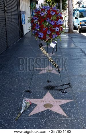 LOS ANGELES - MAR 21: Kenny Rogers star as a wreath is placed at the star of Kenny Rogers on the Hollywood Walk of Fame on March 21, 2020 in Los Angeles, CA. Rogers died late Friday at the age of 81.