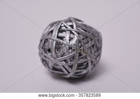 Macro Photography Of Ball Made Of Straw Painted Silver