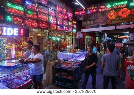 Manila, Philippines - November 25, 2017: People Visit A Neon Store Chinatown In Manila, Philippines.