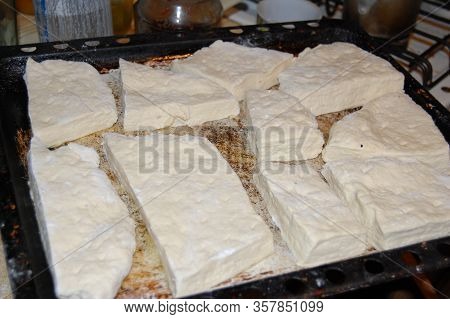 Dough Prepared With Non-roast Sausage For Baking Bread On The Pan.