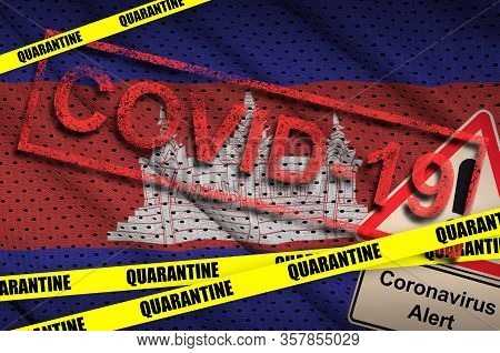 Cambodia Flag And Covid-19 Quarantine Yellow Tape With Red Stamp. Coronavirus Or 2019-ncov Virus