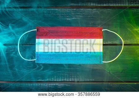 Medical Mask For Protection Against Airborne Diseases, Painted In The National Flag Of Luxembourg
 O