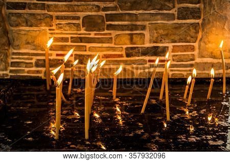 Burning Candles For Dead Or Alive People At Orthodox Or Catholics.