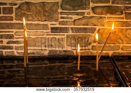 Burning Candles For Dead Or Alive People At Orthodox Or Catholics.