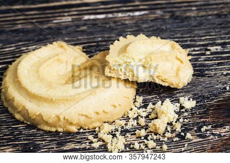 Homemade Beautiful Dry And Crumbly Wheat Flour Cookies On A Wooden Table, Cookies Are Broken Into Pi