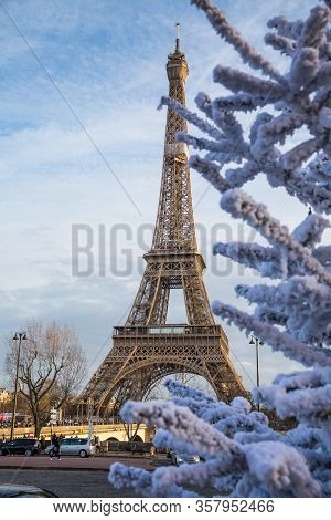 Paris , France - December 15, 2019: Paris Street With View On The Famous Paris Eiffel Tower On A Clo