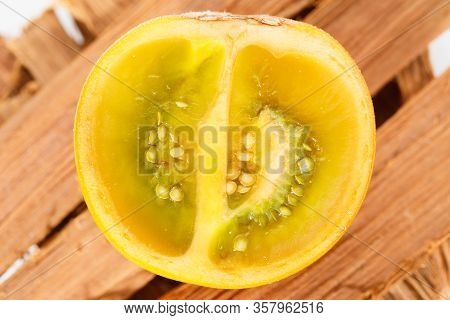Lulo Or Naranjilla Fruit On Wood