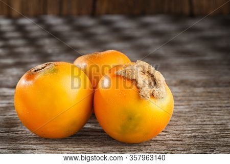 Fruit Of Lulo Or Naranjilla On Wood