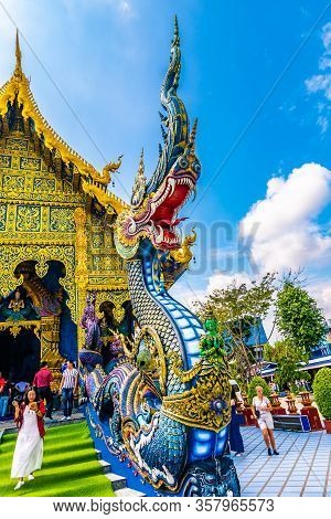Chiang Rai, Thailand - 6.11.2019: The Dragon Statue At Blue Temple (wat Rong Suea Ten) In Chiang Rai