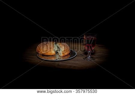 Holy Communion Bread And Wine On Black