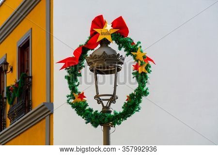 Old Charmant Houses In Los Llanos De Aridane, Cristmas Decoration With Word Peace On It