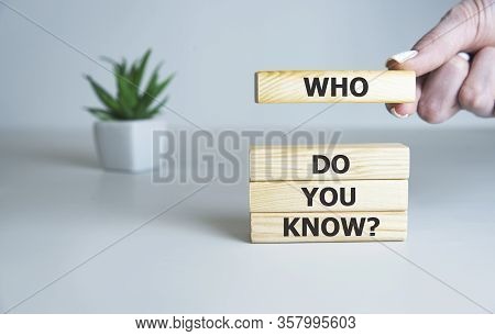Who Do You Know Text On Wooden Cubes, Business Concept.