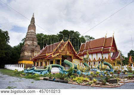 Ancient Ubosot Church And Ruin Stupa Or Chedi And Antique Naga Statue For Thai People Travel Visit P