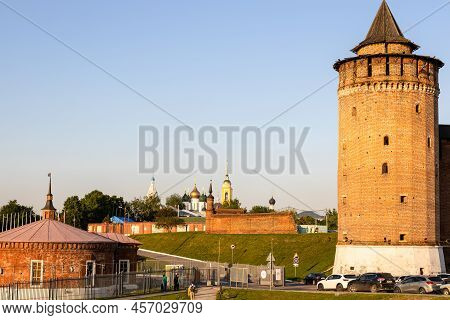 Kolomna, Russia - June 9, 2022: Marinkina Tower , Car Parking And Churches And Cathedral In Ancient 