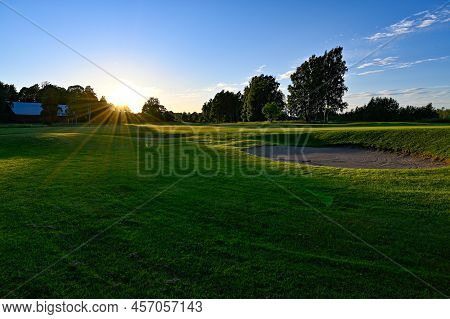 Evening Light Over Golf Course In Kumla Sweden