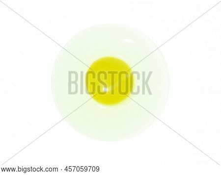 Egg White And Yolk On White Plate (unfried), Isolated, White Background With Copy Space.