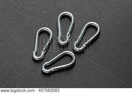 4mm Climbing Carabiner Isolated Against A Dark Background