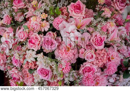 Big Bouquet Of Flowers In A Vase On A Gray Wall Background