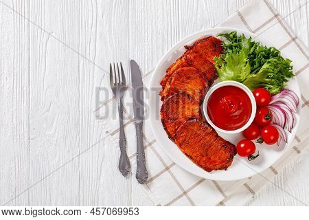 Grilled Slices Of Pork Loin Marinated In Paprika Based Sauce With Fresh Tomatoes And Lettuce, Red On