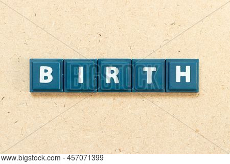 Tile Alphabet Letter In Word Birthon Wood Background