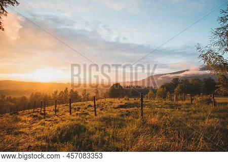 Dramatic Sunset Over A Pristine Landscape With An Approaching Storm From The North Over Part Of Besk