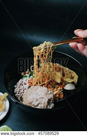 Spicy Tomyum Thai Noodle Soup With Lemon, Chilis,coriander, Lemon Grass. Thai Noodle Street Food.
