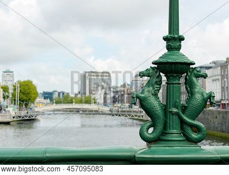 Dublin, Ireland. Ornate Cast Iron Lamps On The Old Grattan Bridge, Featuring The Mythical Hippocampu