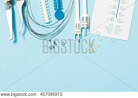 A Set Of Special Tools For An Orthodontist To Install Braces For A Patient. Orthodontic Arcs, Ligatu