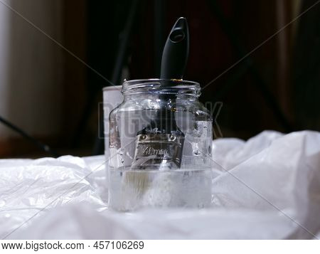 Paint Brush In A Jar Of Turpentine