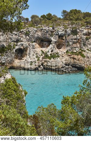 Turquoise Waters In Mallorca. Pilota Cove. Mediterranean Coastline. Spain