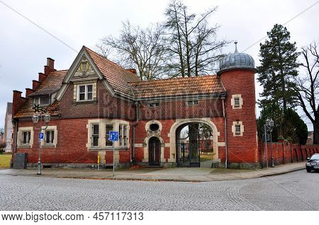Guben, Germany - January 5, 2013: Old House With Gate Exterior On Street Corner Architectural Monume