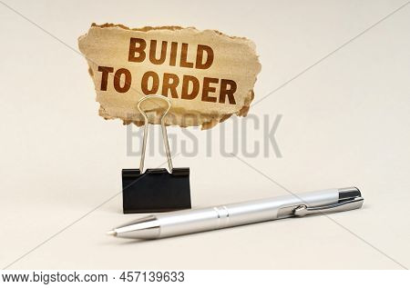 Industry And Business Concept. Next To The Handle Is An Office Clip With A Sign. On The Plate Is The