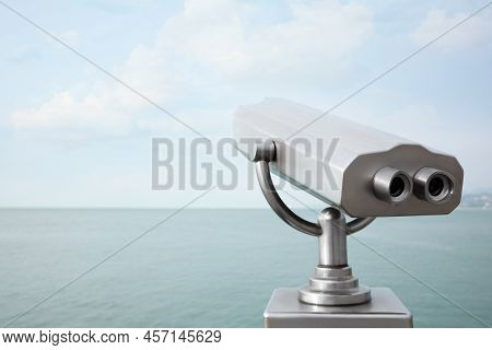 Metal Tower Viewer Installed Near Sea, Space For Text. Mounted Binoculars