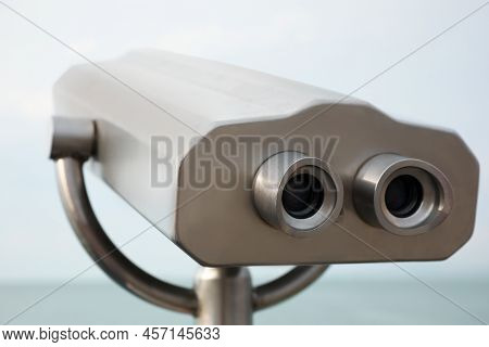 Metal Tower Viewer Installed Near Sea. Mounted Binoculars