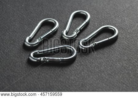 4mm Climbing Carabiner Isolated Against A Dark Background