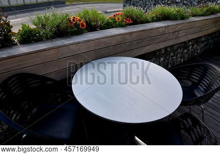 The Railings Of The Terrace On The Balcony Are Formed By Boxes Lined With Natural Terrace Boards Wit