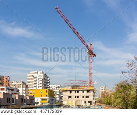 Crains On Construction Site Of Building. Construction Background Copy Space