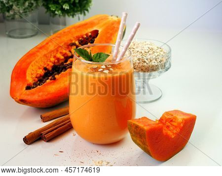 Smoothies Made From Papaya Pulp, Oat Flakes, Cinnamon, Honey, Vegetable Milk. Vegan Beverage For Det