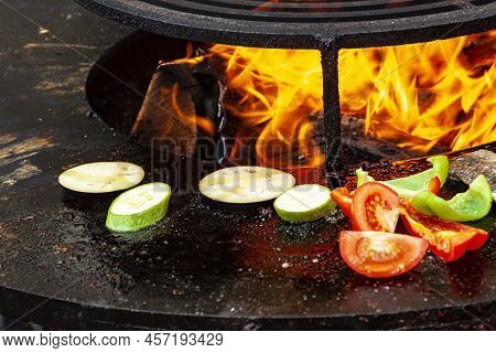Close Up Vegan Cuisine. Big Slice Zucchini, Tomatoes, Pepper Hot Bbq Charcoal Grill. Flames Fire Gri