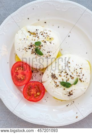 Traditional Buffolo Milk Mozzarella Cheese On The Plate