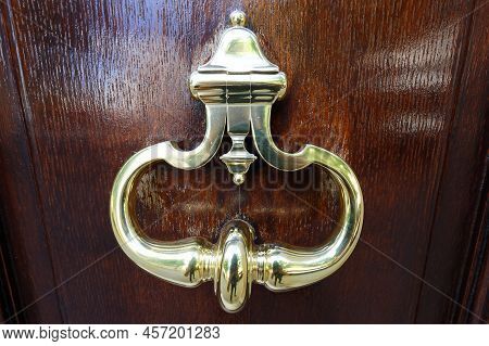 European Vintage Old Metal Wrought Iron Door Knocker. Design Detail. Paris.