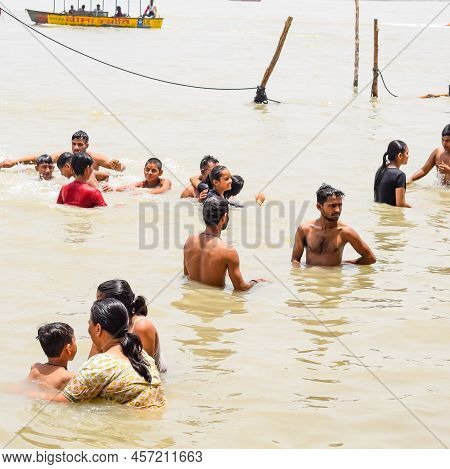 Garh Mukteshwar, Uttar Pradesh, India - June 11 2022 - People Are Taking Holy Dip On The Occasion Of