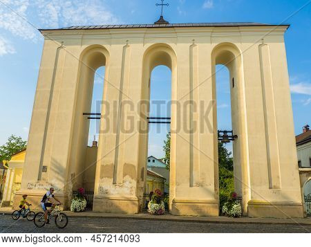 Lutsk, Ukraine- August, 2021: Ancient Belfry Of The Catholic Church In The City Of Lutsk. The Old Be