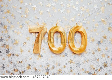 700 Seven Hundred Followers Card Golden Birthday Candle On Festive Background. Template For Social N