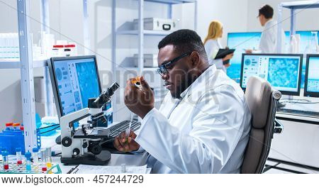 Monkeypox Research Laboratory. Professional Workers Of A Modern Futuristic Lab. Monkey Pox Experimen