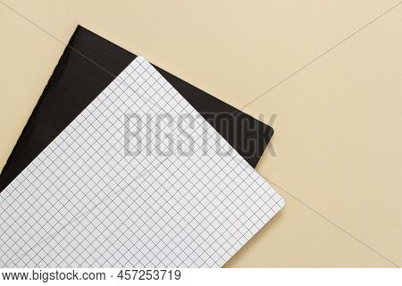 Opem Note Pad On Light Brown Background