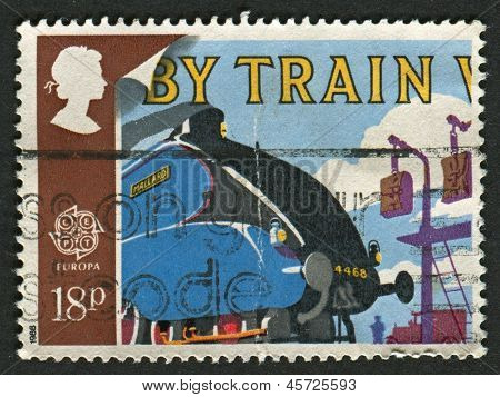 UK - ca 1988: En stämpel tryckt i UK visar bilden av gräsand och postsäckar Pick-up vapenexport. Tran