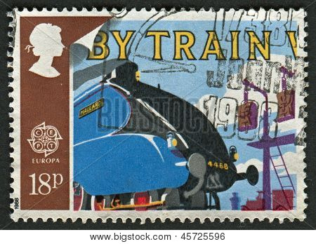 UK - ca 1988: En stämpel tryckt i UK visar bilden av gräsand och postsäckar Pick-up vapenexport. Tran