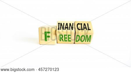 Financial Freedom Symbol. Concept Words Financial Freedom On Wooden Cubes. Beautiful White Table Whi